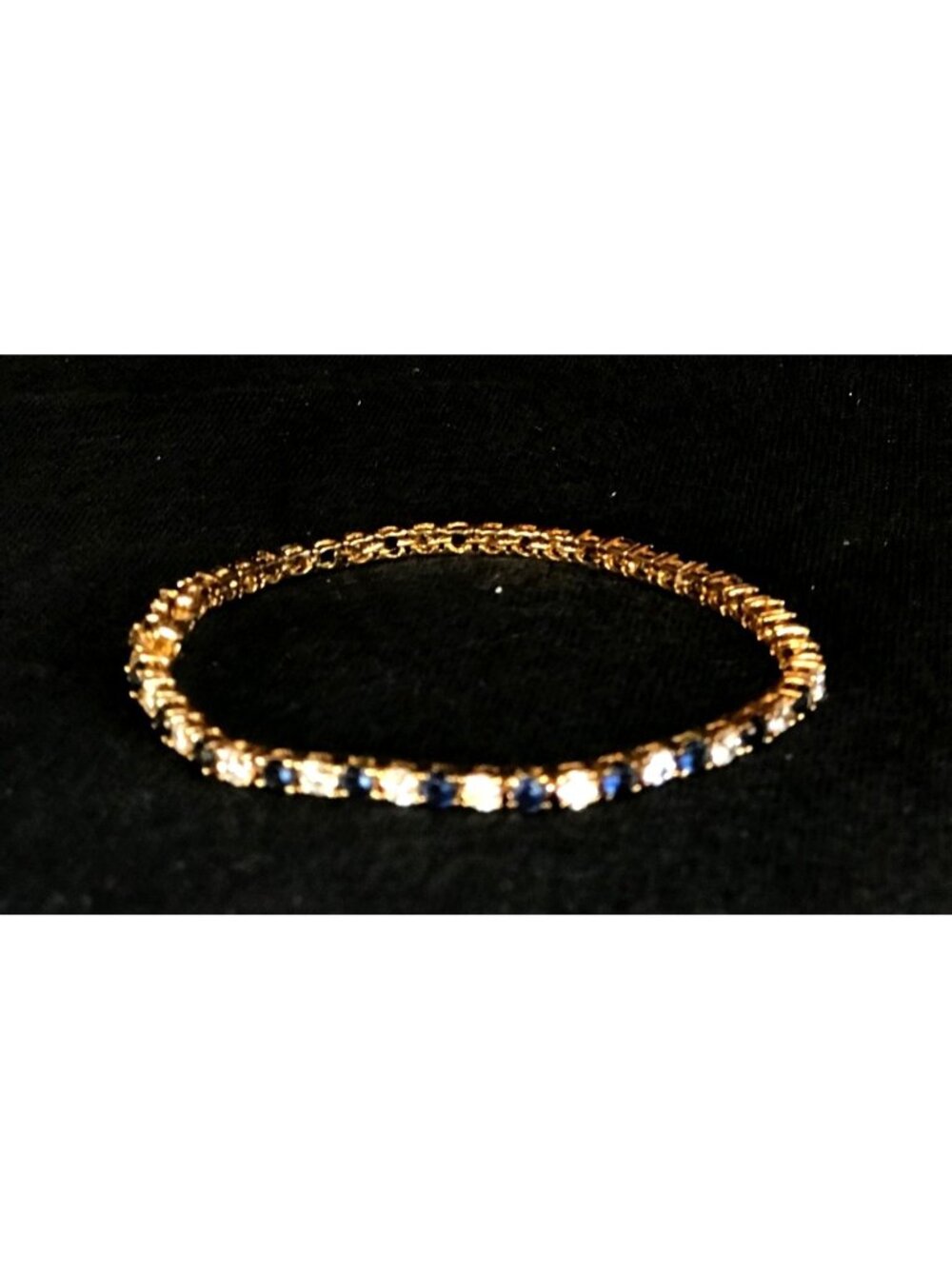 Gold Tone Tennis Bracelet with Blue and Clear Rhinestones with Safety Lock - Picture 2 of 6